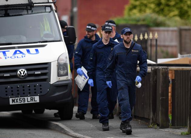 Police officers at a residential property in Fallowfield, Manchester. (AFP) Police officers at a residential property in Fallowfield, Manchester. (AFP)