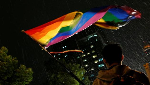 A supporter waves a rainbow flag during a rally after Taiwan's constitutional court ruled that same-sex couples have the right to legally marry, the first such ruling in Asia, in Taipei, Taiwan. (Tyrone Siu/REUTERS) A supporter waves a rainbow flag during a rally after Taiwan's constitutional court ruled that same-sex couples have the right to legally marry, the first such ruling in Asia, in Taipei, Taiwan. (Tyrone Siu/REUTERS)