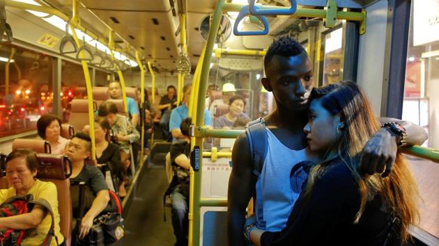 Habib Mamadou Bah, 21, from Guinea, travels with his girlfriend Karin, who is from Hong Kong. Those granted asylum receive HK$1,200 ($154) in monthly food coupons and HK$1,500 ($193) for rent in one of the world’s most expensive cities. (Bobby Yip/REUTERS) Habib Mamadou Bah, 21, from Guinea, travels with his girlfriend Karin, who is from Hong Kong. Those granted asylum receive HK$1,200 ($154) in monthly food coupons and HK$1,500 ($193) for rent in one of the world’s most expensive cities. (Bobby Yip/REUTERS)
