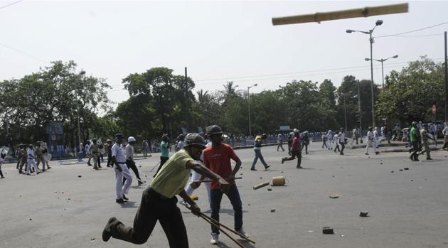 Policemen throwing stones at agitators during Monday’s Left agitation programme in the city. (Samir Jana) Policemen throwing stones at agitators during Monday’s Left agitation programme in the city. (Samir Jana)