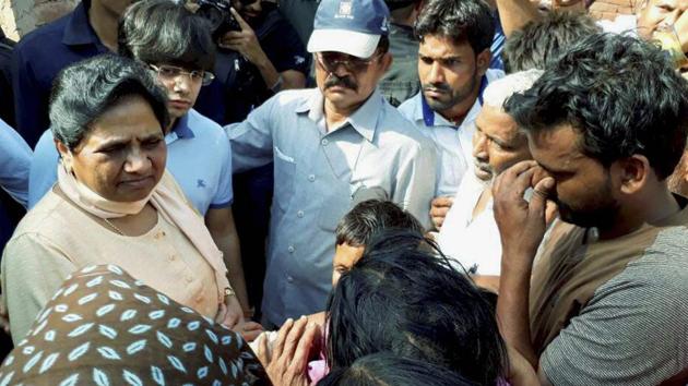 Bahujan Samaj Party chief Mayawati interacts with violence-hit people in Sabbeerpur village in Saharanpur district on Tuesday. (PTI Photo) Bahujan Samaj Party chief Mayawati interacts with violence-hit people in Sabbeerpur village in Saharanpur district on Tuesday. (PTI Photo)