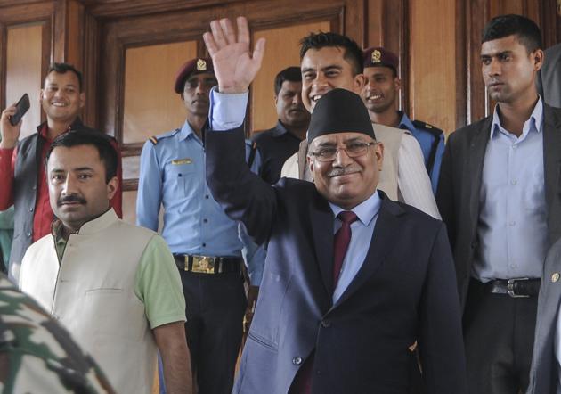 Nepalese Prime Minister Pushpa Kamal Dahal, also known as Prachanda, waves as he leaves after announcing his resignation during an address to the nation in Kathmandu on Wednesday. (AFP) Nepalese Prime Minister Pushpa Kamal Dahal, also known as Prachanda, waves as he leaves after announcing his resignation during an address to the nation in Kathmandu on Wednesday. (AFP)