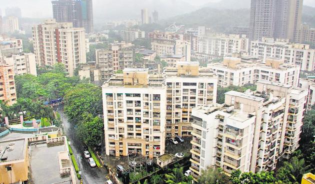 These structures are over 50 years old and house 500 units of which 247 are residential and the rest are commercial. (HT file photo) These structures are over 50 years old and house 500 units of which 247 are residential and the rest are commercial. (HT file photo)