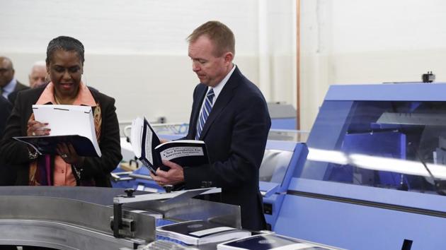 White House budget director Mick Mulvaney (right) and government publishing office director inspect the production run of US President Donald Trump’s fiscal 2018 federal budget on May 19. (AP File Photo) White House budget director Mick Mulvaney (right) and government publishing office director inspect the production run of US President Donald Trump’s fiscal 2018 federal budget on May 19. (AP File Photo)