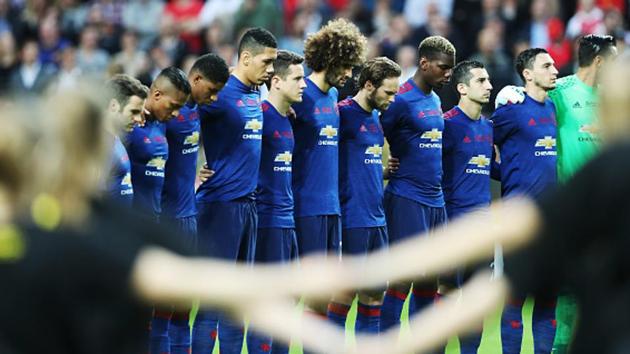 Manchester United players observe a minute’s silence before the UEFA Europa League final match against Ajax Amsterdam at Friends Arena in Stockholm on Wednesday. The whole of the stadium stood in solidarity, observing silence to pray and honour the victims of the Manchester terror attack on May 22. (Getty Images)
