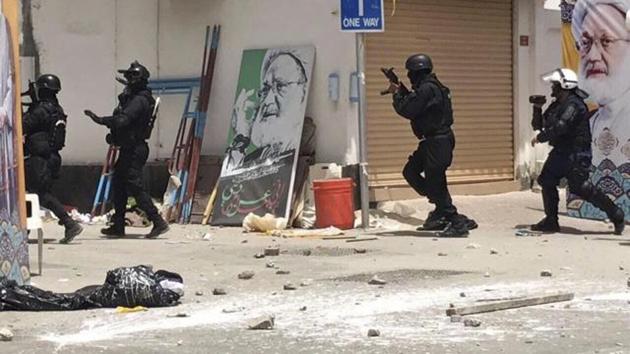This image provided by an activist who requested to remain unnamed, shows Bahraini security forces during a raid on a sit-in demonstration, in Diraz, Bahrain, Tuesday, May 23, 2017. (AP Photo) This image provided by an activist who requested to remain unnamed, shows Bahraini security forces during a raid on a sit-in demonstration, in Diraz, Bahrain, Tuesday, May 23, 2017. (AP Photo)