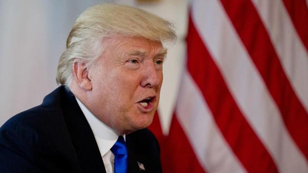 U.S. President Donald Trump talks as he meets with French President Emmanuel Macron at the U.S. ambassador's residence in Brussels, Thursday, May 25, 2017.(AP Photo)