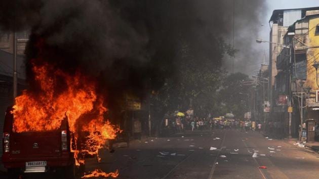 A view of a street near Lalabazar. A police vehicle was set on fire on B B Ganguly street while some police vehicles were damaged, allegedly by BJP workers, on Central Avenue and Bentinck street. (PTI) 