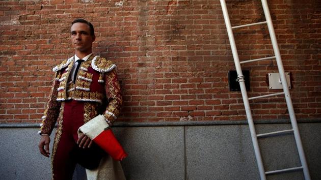 Bullfighter Juan Bautista waits for the start of the bullfight.The world famous San Isdiro bullfight festival takes place during the month of May-June and brings together the best fighters, bulls and aficionados. (Susana Vera / REUTERS) Bullfighter Juan Bautista waits for the start of the bullfight.The world famous San Isdiro bullfight festival takes place during the month of May-June and brings together the best fighters, bulls and aficionados. (Susana Vera / REUTERS)