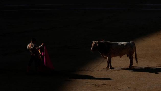 Bullfighter Juan Bautista performs a pass to a bull during San Isidro's bullfighting fair at Madrid. (Susana Vera / REUTERS) Bullfighter Juan Bautista performs a pass to a bull during San Isidro's bullfighting fair at Madrid. (Susana Vera / REUTERS)