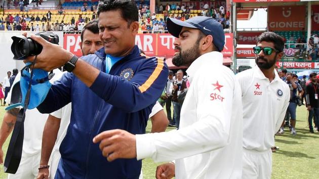 Anil Kumble and Virat Kohli on day 4 of the fourth Test match between India and Australia in Dharamsala on March 28. Anil Kumble’s tenure as Indian cricket team coach ends in June 2017 after the completion of the ICC Champions Trophy in UK(BCCI)