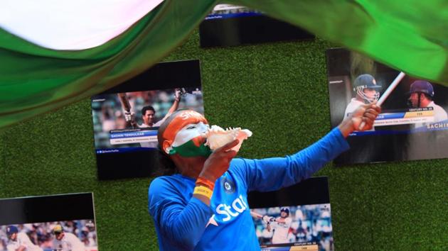There can never be a Sachin Tendulkar event without his biggest fan Sudhir Chaudhary present. Sudhir, face painted in India colours and waving the national flag, was present at the premiere as well. (Prodip guha)