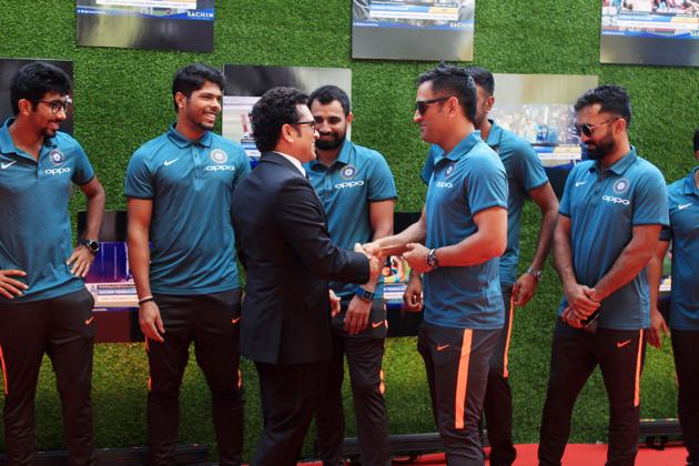 MS Dhoni greets Sachin Tendulkar at the premiere of ‘Sachin:A Billion Dreams’ at PVR Icon in Andheri, Mumbai, on Wednesday. It was Tendulkar, who first nominated Dhoni for India cricket team’s limited-overs captaincy, and the rest is history! (prodip guha)