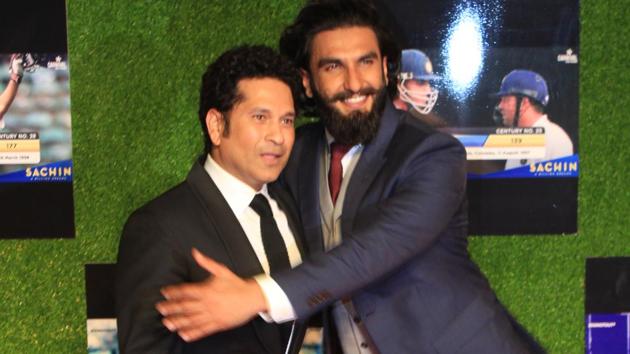 Bollywood star Ranveer Singh hugs Sachin Tendulkar, before cracking a few jokes, at the premiere of ‘Sachin:A Billion Dreams’ at PVR Icon in Andheri, Mumbai, on Wednesday. (prodip guha)