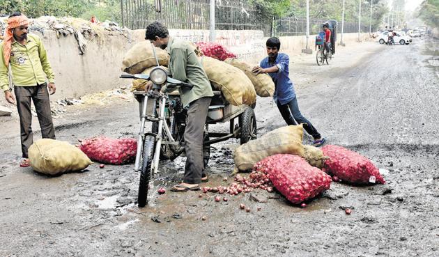 A damaged road in east Delhi’s Dallupura. Apart from the Ring Road and Outer Ring Road, PWD is now repairing its smaller roads too. (Mohd Zakir/HT Photo) A damaged road in east Delhi’s Dallupura. Apart from the Ring Road and Outer Ring Road, PWD is now repairing its smaller roads too. (Mohd Zakir/HT Photo)