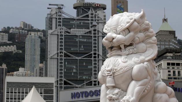 Moody's has cut its credit rating for Hong Kong hours after downgrading China for rising debt levels, which it said would have "significant impact" on the Asian financial hub because of their close links. (AP) Moody's has cut its credit rating for Hong Kong hours after downgrading China for rising debt levels, which it said would have "significant impact" on the Asian financial hub because of their close links. (AP)