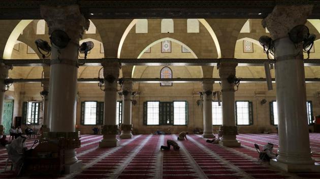 Muslim men pray inside al-Aqsa Mosque, the third holiest shrine in Islam.During the entire month, the believers fast from sunrise to sunset, a spiritual discipline of deep contemplation on ones relationship with God, increased charity and generosity and study of the holy Quran. (Ammar Awad/REUTERS)