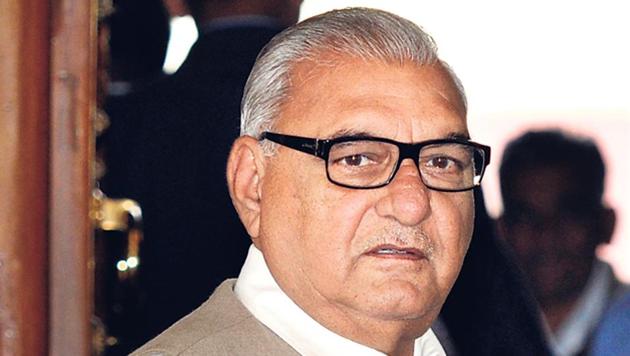 Haryana chief Minister Bhupinder Singh Hooda had been named as an accused by ED under PMLA in a land acquisition case.(HT Photo)
