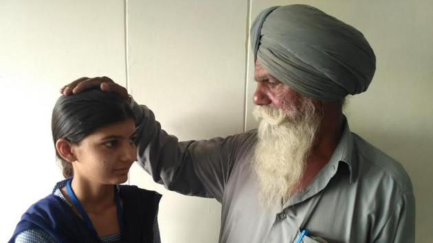 “Though my parents are not in a position to support my education, they still want me to pursue my studies. At times, my father does not get work all 30 days of the month. We four siblings are dependent on him,” says Kaur. (HT PHOTO)