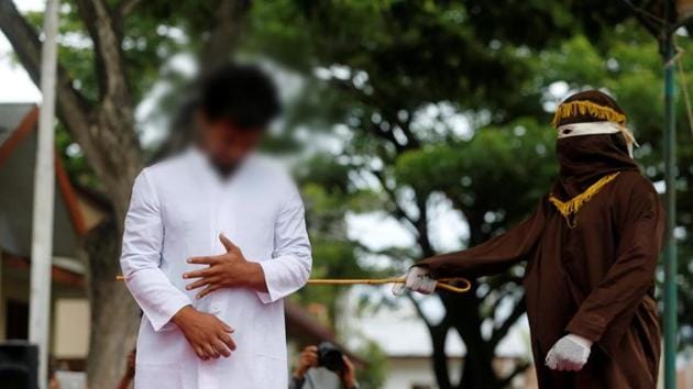 In Photos Indonesian Men Caned For Gay Sex In Aceh Hindustan Times