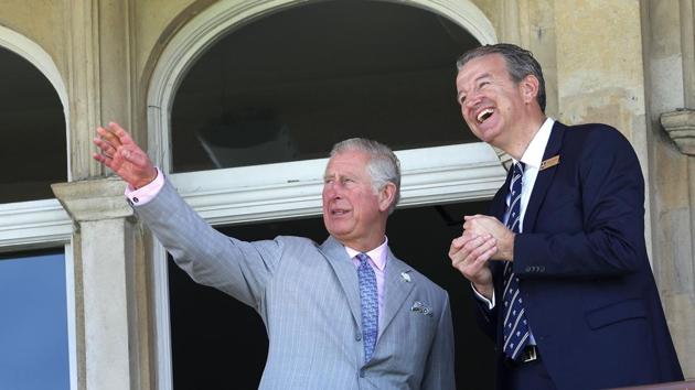 Britain's Prince Charles, Prince of Wales talks to Surrey County Cricket Club chairman, Richard Thompson (R). Surrey County Club play their matches at The Oval, London which will be a venue for the Champions Trophy. (AFP)