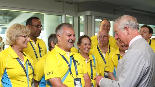 Prince Charles, talks to volunteers, known as Cricketeers, who will marshal all tournament matches. (AFP)
