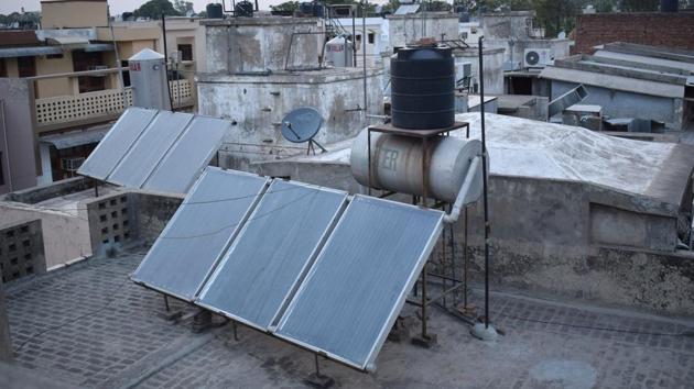 Solar panels on rooftops of a house in Sector 38, Chandigarh. (Sikander Singh/HT Photo)