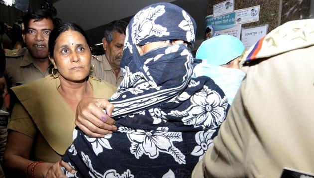 One of the women had earlier given statements that three of the six accused were her neighbours. However, she retracted from her statement on Friday morning giving a clean chit to the three.(Sunil Ghosh/HT Photo)
