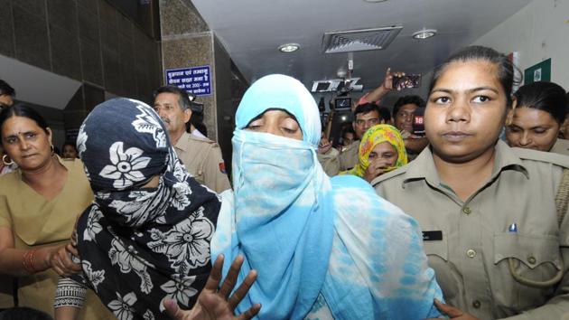 The victims at the Noida district hospital after a medical examination on Thursday.(Sunil Ghosh /HT Photo)