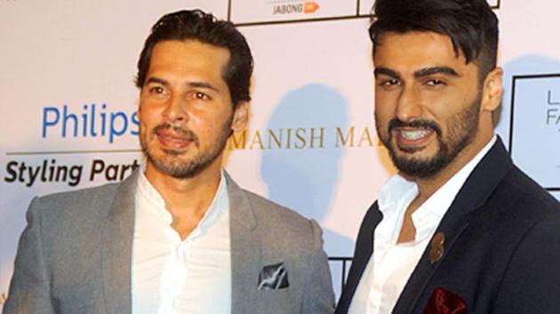 Dino Morea and Arjun Kapoor pose for a photograph during LFW Winter/Festive 2015. Dino Morea and Arjun Kapoor pose for a photograph during LFW Winter/Festive 2015.