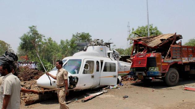 The wreckage of the helicopter, carrying Maharashtra chief minister Devendra Fadnavis and his team, that crashed-landed in Latur on Thursday. (PTI Photo) The wreckage of the helicopter, carrying Maharashtra chief minister Devendra Fadnavis and his team, that crashed-landed in Latur on Thursday. (PTI Photo)