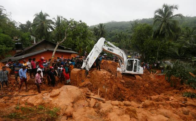 Military officials work during a rescue mission at the site of a landslide in Bellana village in Kalutara, Sri Lanka.(Reuters) Military officials work during a rescue mission at the site of a landslide in Bellana village in Kalutara, Sri Lanka.(Reuters)