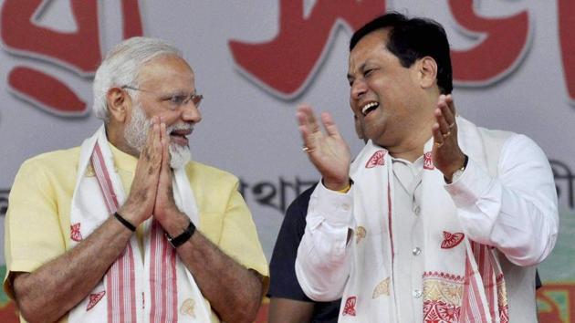 Prime Minister Narendra Modi with Assam chief minister Sarbananda Sonowal during a public rally organised to celebrate the third anniversary of the NDA government at the Centre, in Guwahati on Friday. (PTI) Prime Minister Narendra Modi with Assam chief minister Sarbananda Sonowal during a public rally organised to celebrate the third anniversary of the NDA government at the Centre, in Guwahati on Friday. (PTI)