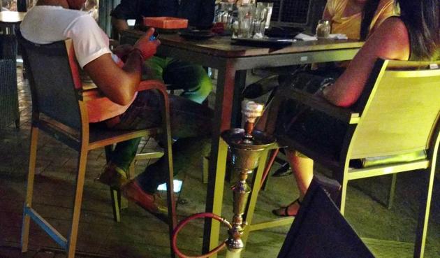 Hookahs will no longer be permitted in smoking zones at hotels, restaurants and airports with the government changing rules of smoking in public.(HT Archive)