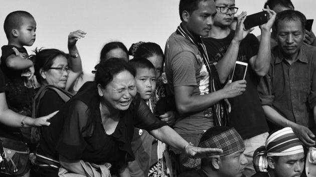 A mother mourns at her son’s grave. After the killings, women had taken over the leadership of the movement, including attending to the dead bodies. (Ravi Choudhary/HT PHOTO)