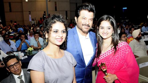 Artist Manjot Kaur (L), Bollywood actor Anil Kapoor, and youngest BDC chairperson Prajwal Bushta at HT Youth Forum in Chandigarh on Friday (Keshav Singh/HT Photo)