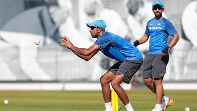India's Ravichandran Ashwin takes a catch during a practice session at Lord's Cricket Ground in London. (AFP) 