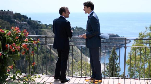 Justin Trudeau (right) with Emmanuel Macron in Taormina, Sicily. (AFP Photo) Justin Trudeau (right) with Emmanuel Macron in Taormina, Sicily. (AFP Photo)