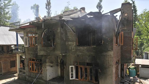 A damaged house where Sabzar Ahmad Bhat, head of the Hizbul Mujahideen militant group, was killed in an overnight gunfight in Kashmir’s Tral.(Waseem Andrabi / HT Photo) A damaged house where Sabzar Ahmad Bhat, head of the Hizbul Mujahideen militant group, was killed in an overnight gunfight in Kashmir’s Tral.(Waseem Andrabi / HT Photo)