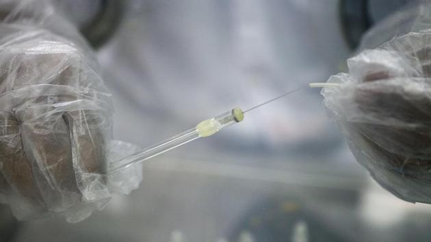 A research assistant prepares a syringe at the research laboratory for a new male contraceptive at the Indian Institute of Technology (IIT) Kharagpur. The drug could prove revolutionary because it’s the first reversible birth control for men.(Getty Images) A research assistant prepares a syringe at the research laboratory for a new male contraceptive at the Indian Institute of Technology (IIT) Kharagpur. The drug could prove revolutionary because it’s the first reversible birth control for men.(Getty Images)