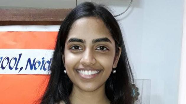 Raksha Gopal, a student of Amity International School at Noida sector 44, scored 100 in three subjects – English Core, Political Science and Economics.(Handout image)