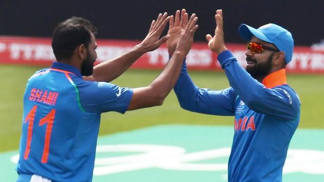 Bhuvneshwar Kumar and Mohammed Shami took three wickets each while Ravindra Jadeja grabbed two. (AFP )