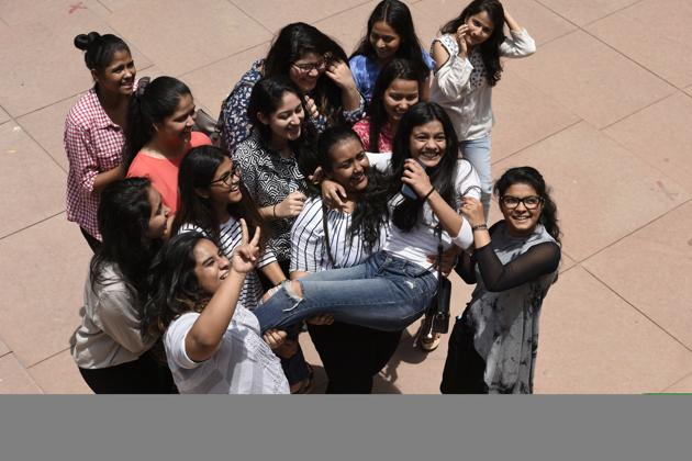 Students of St Thomas School celebrate after declaration of class 12th CBSE result at their school in New Delhi. (Saumya Khandelwal/HT PHOTO) Students of St Thomas School celebrate after declaration of class 12th CBSE result at their school in New Delhi. (Saumya Khandelwal/HT PHOTO)