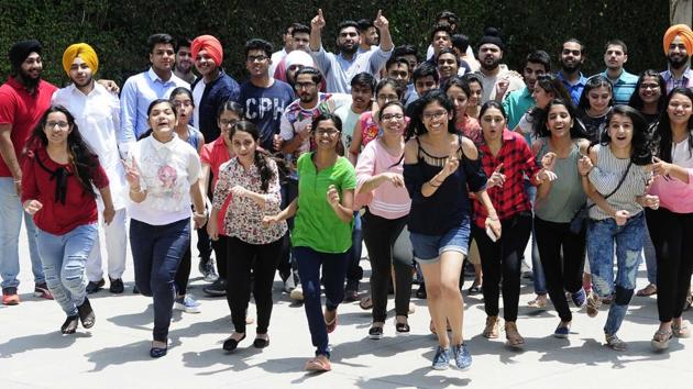 Students of DPS School Sector 40, Chandigarh in jubilant mood after CBSE Class 12 results were declared on Sunday. (Keshav Singh/HT)