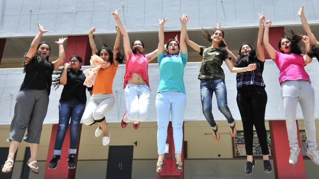 Students of Mount Carmel School in Sector 9, Chandigarh celebrating their success after results of CBSE Class 12 were declared on Sunday. (Ravi Kumar/HT)