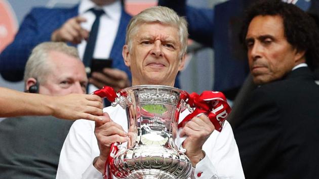 Arsene Wenger led Arsenal to a record 13th FA Cup win on Saturday with a 2-1 win over Chelsea in the final. (AFP) Arsene Wenger led Arsenal to a record 13th FA Cup win on Saturday with a 2-1 win over Chelsea in the final. (AFP)