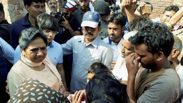 File photo of BSP chief Mayawati interacts with violence-hit people in Shabbirpur village in Saharanpur district . (PTI) File photo of BSP chief Mayawati interacts with violence-hit people in Shabbirpur village in Saharanpur district . (PTI)