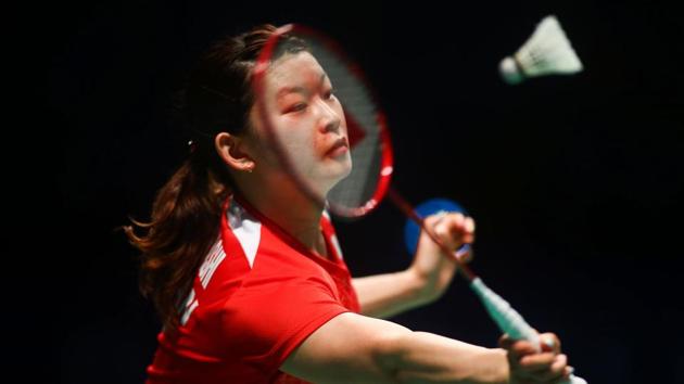 Ayaka Takahashi of Japan hits a return during the women's doubles Sudirman Cup match with partner Misaki Matsutomo against Vivian Hoo and Woon Khe Wei of Malaysia at the Gold Coast Sports Centre. (Patrick HAMILTON / AFP)