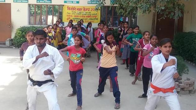 Nagepur girls undergoing training in martial arts. (HT Photo) Nagepur girls undergoing training in martial arts. (HT Photo)