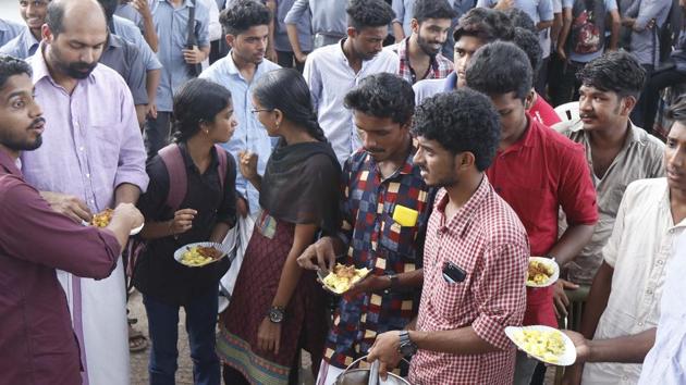 Youth Congress activists slaughtered a cattle at the heart of Kannur town in Kerala on Sunday evening and cooked the meat in full view during a ‘Beef Fest’. (HT Photo) Youth Congress activists slaughtered a cattle at the heart of Kannur town in Kerala on Sunday evening and cooked the meat in full view during a ‘Beef Fest’. (HT Photo)